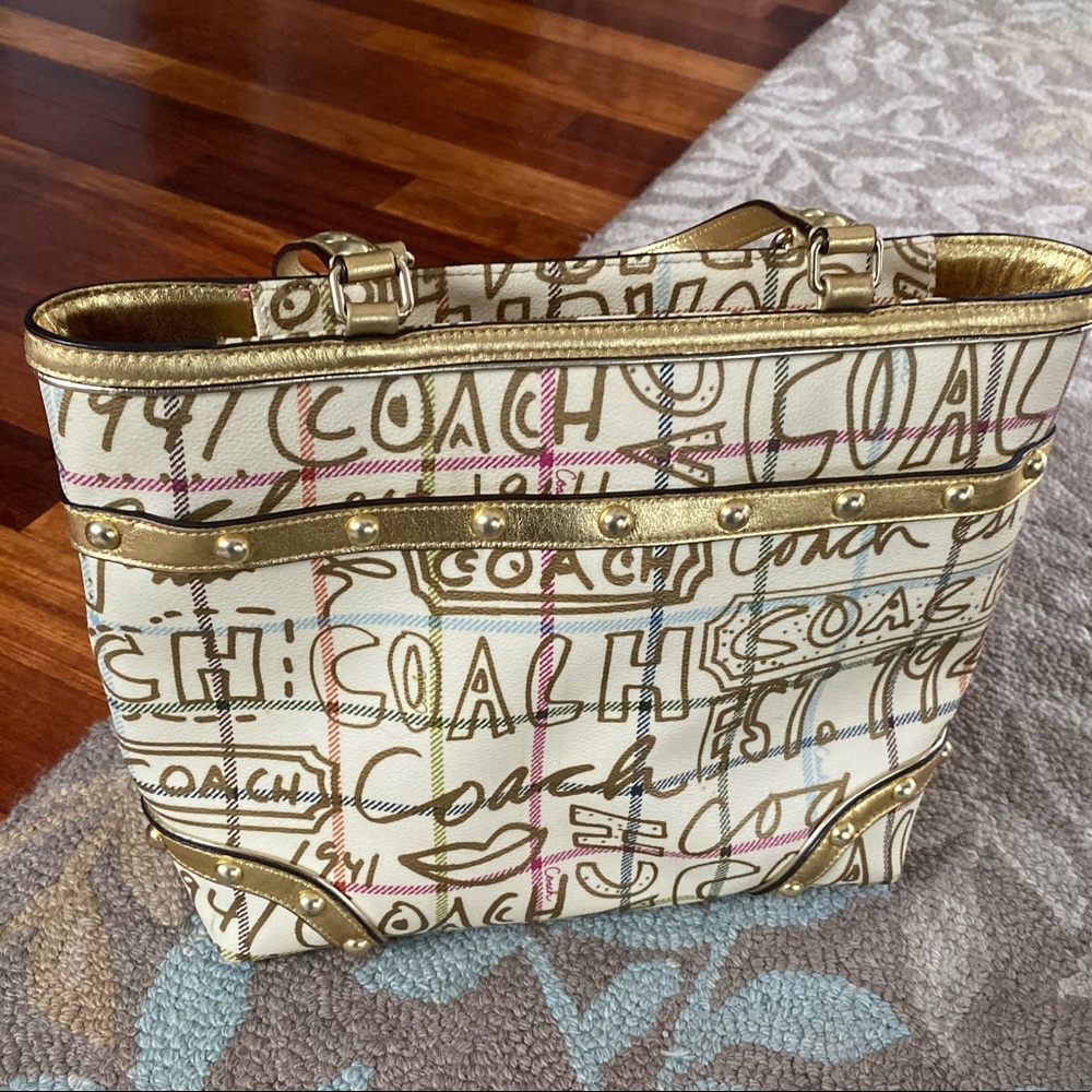 Authentic coach bag. Ivory and gold with studs!
